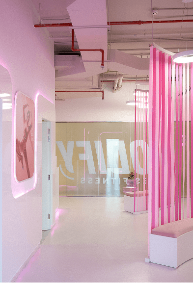Bright hallway with pink design accents in the modern BODIFY interior