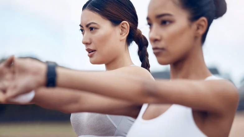 Women exercising together in a fitness class, focusing on effective calorie burning workouts in Dubai